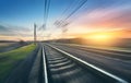 Railroad in motion at sunset. Railway station Royalty Free Stock Photo