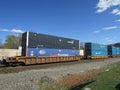 Railroad platform cars with Pacer Stacktrain, Umax and C.H. Robinson intermodal. Royalty Free Stock Photo