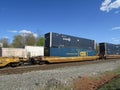 Railroad platform cars with Umax and CSX intermodal containers in West Haverstraw, NY.