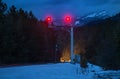 Railroad signals at night with Mountains