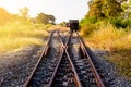 Railroad switch with train in the morning sun. The conception of Royalty Free Stock Photo