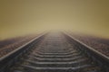 Railroad to horizon in fog