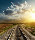 Railroad to horizon in sunset
