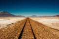 Railroad to nowhere in a stone desert, Uyuni, Bolivia Royalty Free Stock Photo