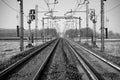 Railroad track in the countryside. Black and white photo Royalty Free Stock Photo