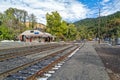 Railroad tracks approach the Amtrak train station in Dunsmuir, California, USA - November 11, 2022 Royalty Free Stock Photo