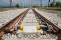 Railroad tracks closeup with derailing block Royalty Free Stock Photo