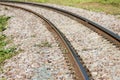 The railroad tracks curve along the way Royalty Free Stock Photo