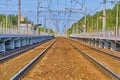 railroad tracks empty view of the platform color Royalty Free Stock Photo