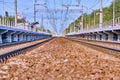 railroad tracks empty view of the platform color Royalty Free Stock Photo