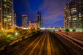 Railroad tracks and modern buildings at night, in downtown Toronto, Ontario. Royalty Free Stock Photo