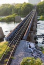 Railroad tracks over a raging river Royalty Free Stock Photo