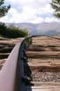 Railroad tracks, Rocky Mountains, perspective Royalty Free Stock Photo