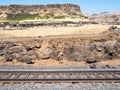 Railroad tracks running along the canyon wall in Washington state, USA Royalty Free Stock Photo