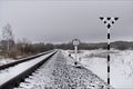 Railroad tracks in the steppe covered with snow