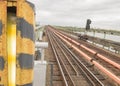 Railroad tracks subway on the bridge in the open air. Railway, rails in city. Travel concept, train trip, rest. The urban metro Royalty Free Stock Photo