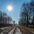 Railroad tracks in sunlight - winter impression