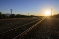 Railroad Tracks at Sunset Royalty Free Stock Photo