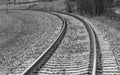 Railroad Tracks Turn Off To New Adventure in Travel Royalty Free Stock Photo