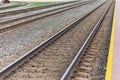 Railroad tracks urban shoot. Leading line view.iron rusty train railway over dark stones rail way Royalty Free Stock Photo