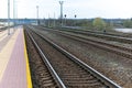 Railroad tracks urban shoot. Leading line view.iron rusty train railway over dark stones rail way Royalty Free Stock Photo