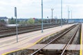 Railroad tracks urban shoot. Leading line view.iron rusty train railway over dark stones rail way Royalty Free Stock Photo