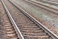 Railroad tracks urban shoot. Leading line view.iron rusty train railway over dark stones rail way Royalty Free Stock Photo