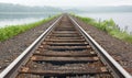 Railroad tracks vanish in the mist Royalty Free Stock Photo