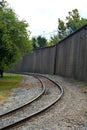 Tracks and floodwall Royalty Free Stock Photo