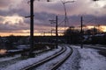 Railroad tracks in a winter foggy morning sprinkled with snow Royalty Free Stock Photo