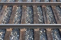 Railroad Tracks and Wooden Ties on a Stone Track Ballast Royalty Free Stock Photo