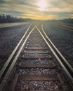 railroad train tracks at sunset desert Royalty Free Stock Photo