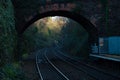 Railroad and Train Tunnel, Old tracks through a tunnel, Railroad tracks with a junction on the front Royalty Free Stock Photo