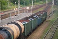 Railroad transportation, tourism travel. Evening Railway platform and station. Industrial concept, cargo freight train background Royalty Free Stock Photo