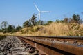 Railroad and wind turbine Royalty Free Stock Photo