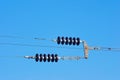 Railroad wire pole against blue sky Royalty Free Stock Photo