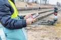 Railroad worker collects data