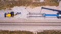 Railroad workers repairing a broken track. Repairing railway. Rail tracks maintenance process.