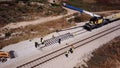 Railroad workers repairing a broken track. Repairing railway. Rail tracks maintenance process.