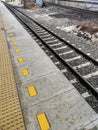 Railroads with perspective photo composition and yellow line