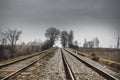 Rails (dormitories) at the electrified railway corridor. Cloudy weather. Gazakh Azerbaijan Royalty Free Stock Photo