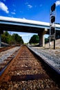 Rails passing under bridge