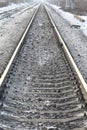 Rails railroad tracks winter time Royalty Free Stock Photo