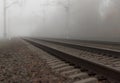 Rails on the railway, leaving into the foggy distance