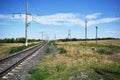 Rails on the railway in the steppe on a sunny day Royalty Free Stock Photo