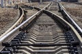 Rails, sleepers and a mechanism for converting a switch Royalty Free Stock Photo
