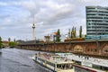 Railway arcades at the river Spree in the center of Berlin. In the background you can see the Red Town Hall, the Alexander Tower a