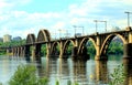 Railway arched bridge across the Dnieper River in the city Dnipro Royalty Free Stock Photo