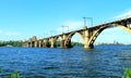 Railway arched bridge across the Dnieper River with a view of the Dnipro city Royalty Free Stock Photo