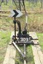 Railway arrow in black with a lever and pointer in Russia. The device for the transfer of rails at intersections for